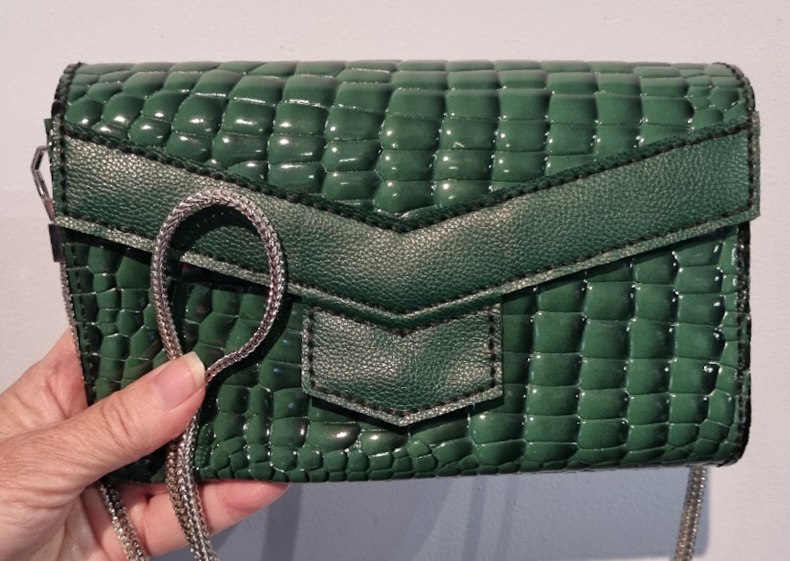 Green faux crocodile clutch purse with detachable silver chain