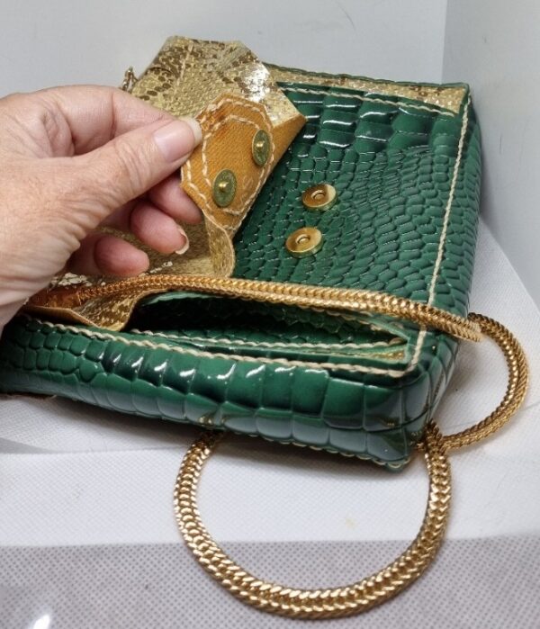 The Banksia = Compact shoulder bag showing the clasp